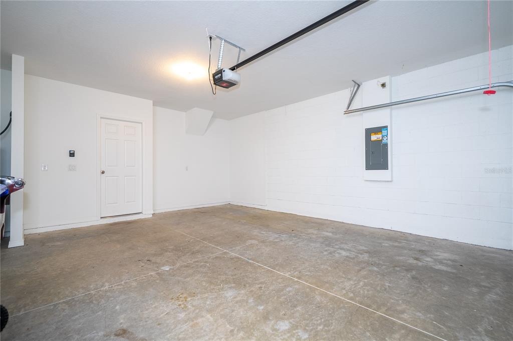 4549 Burrowing Owl Loop St. Cloud, FL 34772 - Photo 34 of 77 a view of an empty room