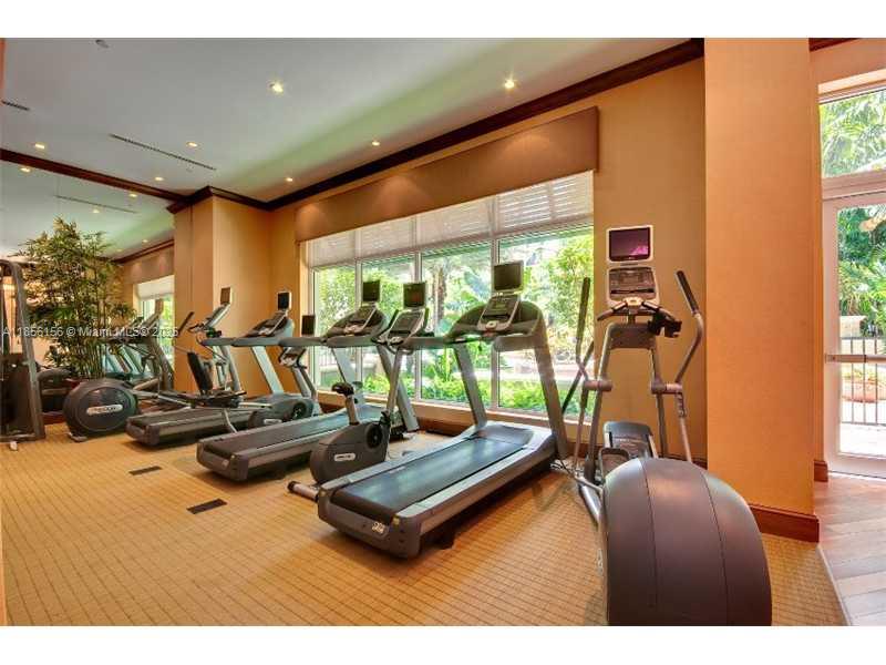 510 Northwest 84th Avenue, Unit 324 Plantation, FL 33324 - Photo 3 of 25 a room with gym equipment and windows