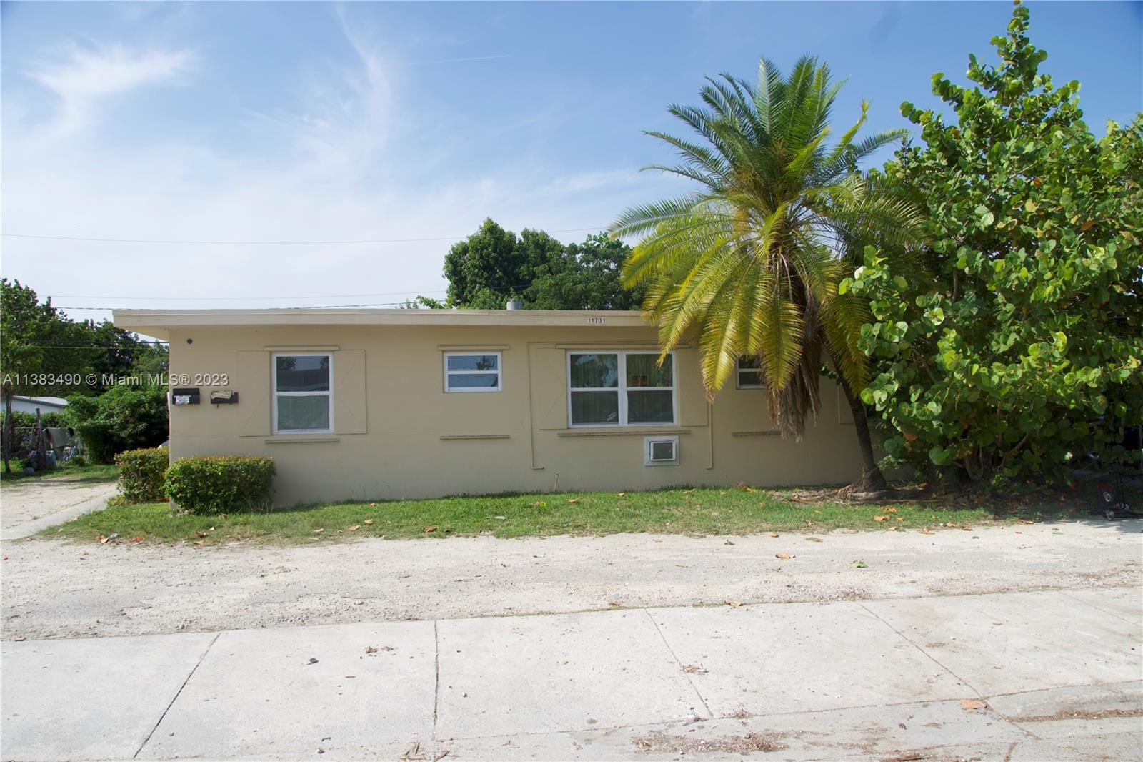 Goulds Miami, FL 33170 - Photo 2 of 10 a front view of a house with a yard