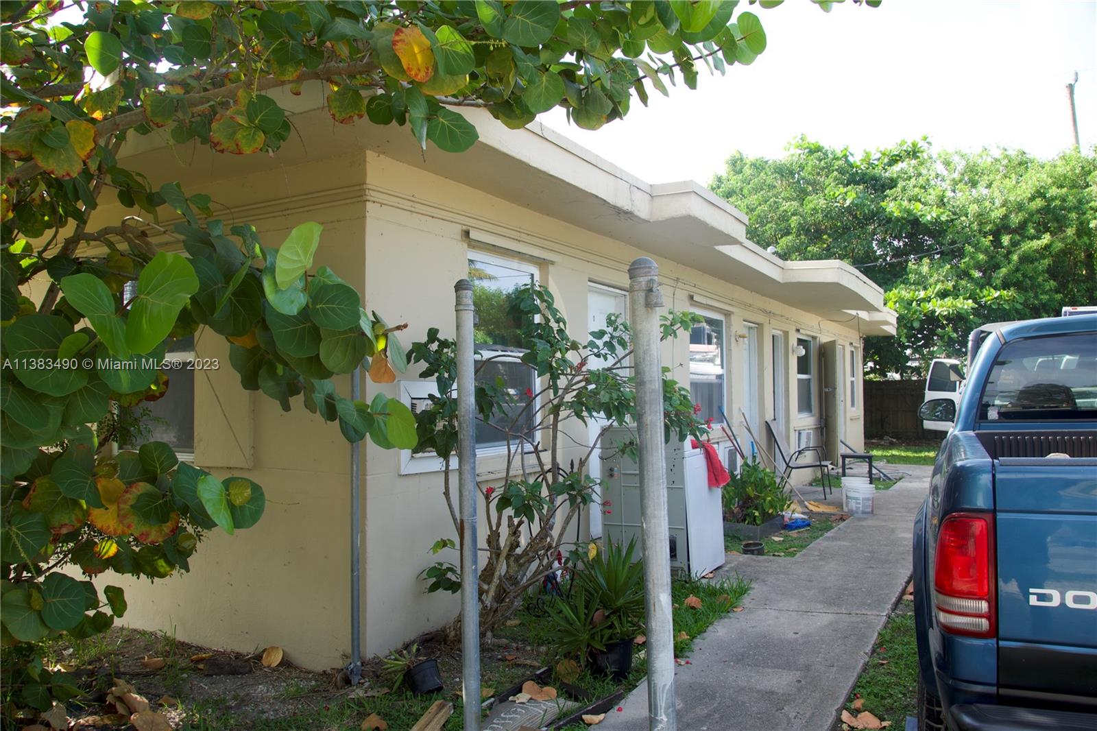 Goulds Miami, FL 33170 - Photo 4 of 10 a potted plant sitting in front of a house