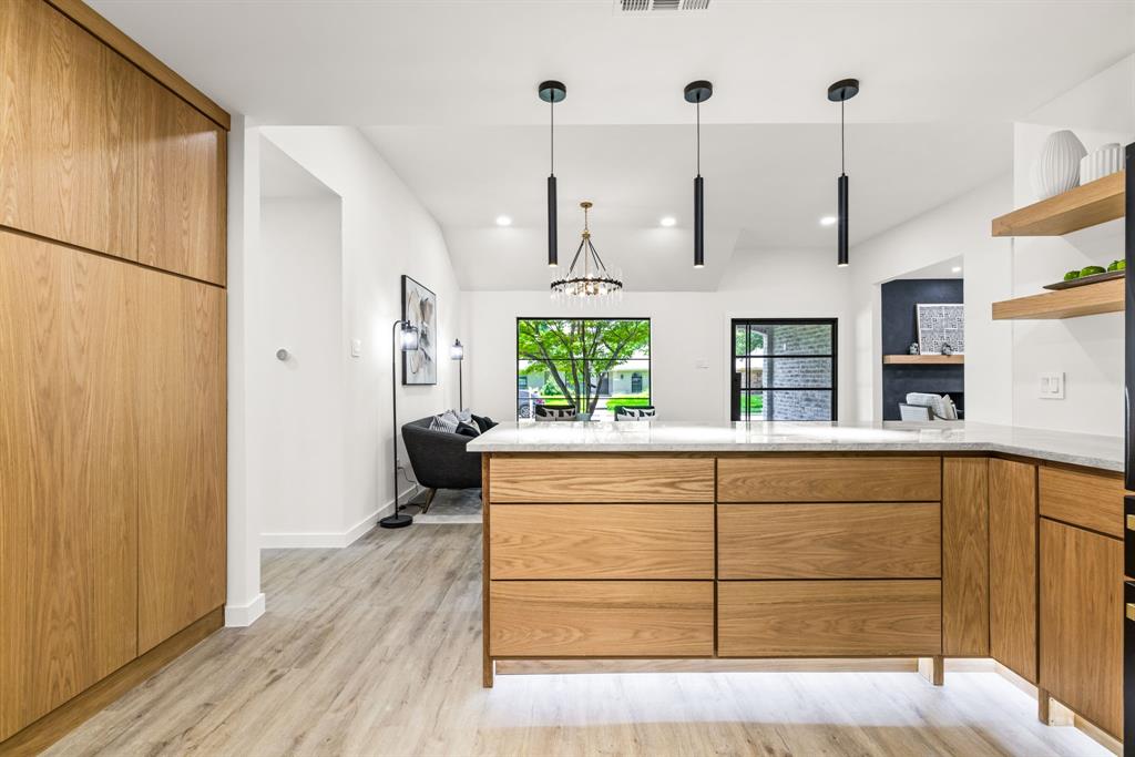 1112 Chesterton Drive Richardson, TX 75080 - Photo 14 of 31 a view of a kitchen with cabinets