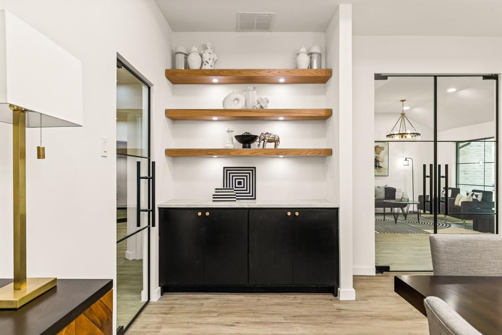 1112 Chesterton Drive Richardson, TX 75080 - Photo 18 of 31 a view of wooden floor in a kitchen