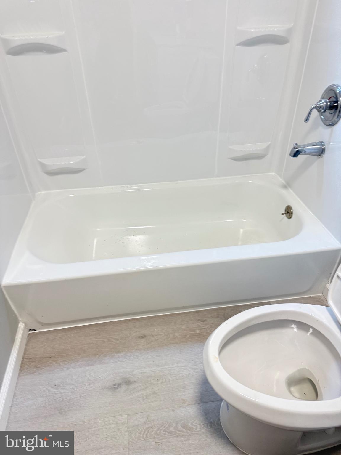 930 Woodlane Road Mount Holly, NJ 08060 - Photo 13 of 26 a bathroom with a toilet and a bathtub