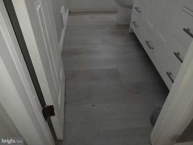 a view of a room that has a window