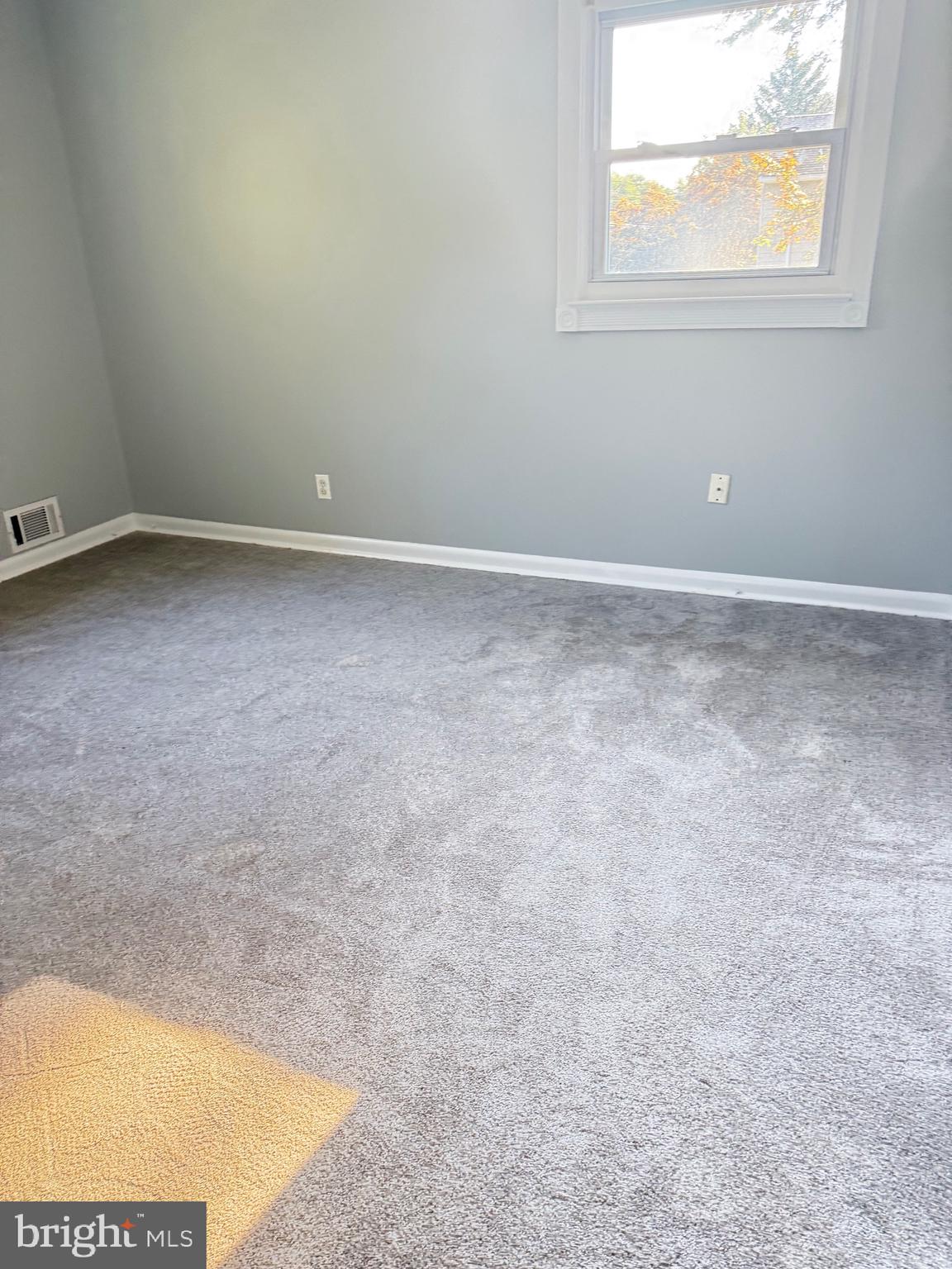 930 Woodlane Road Mount Holly, NJ 08060 - Photo 16 of 26 an empty room with a window