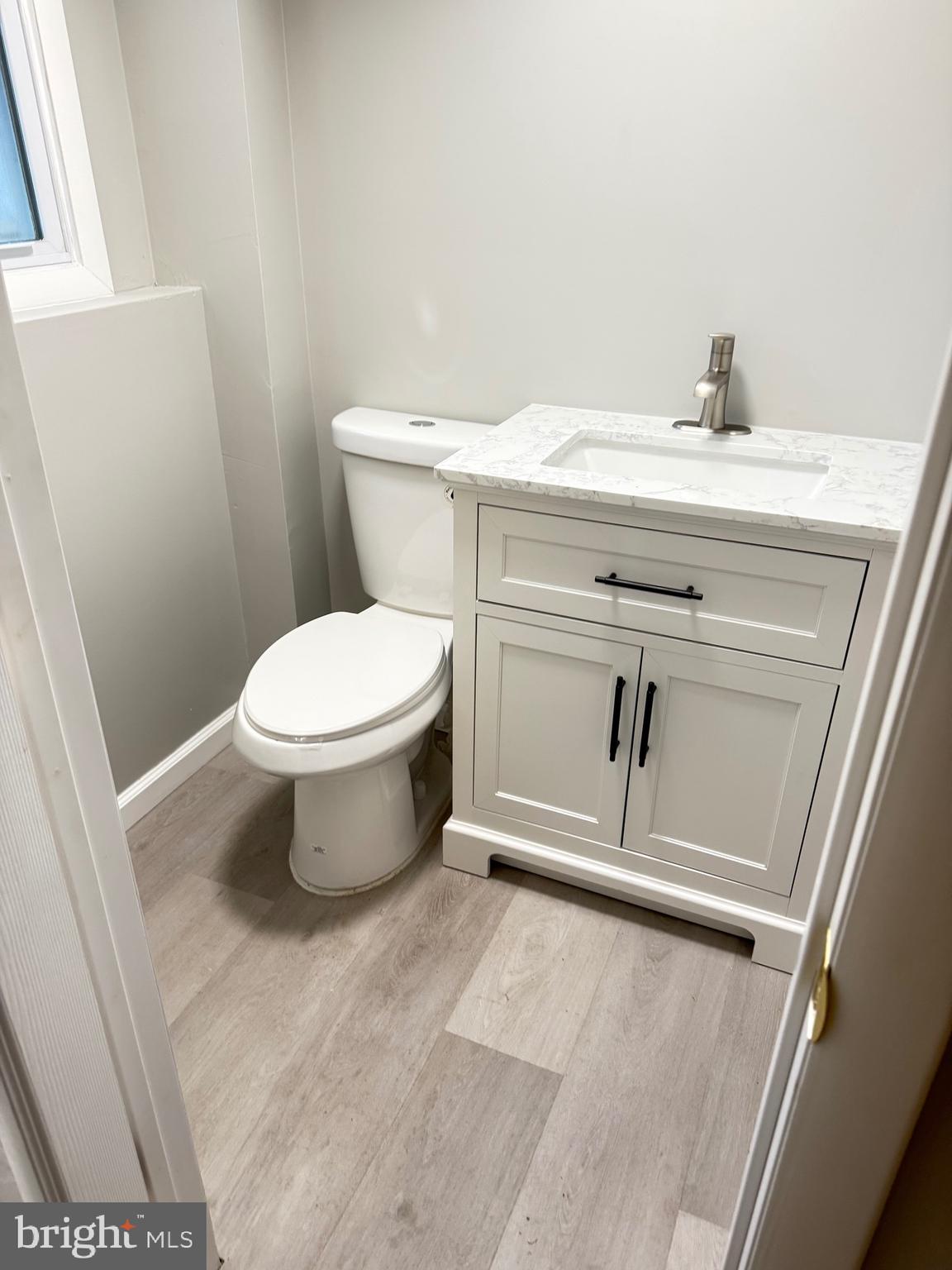 930 Woodlane Road Mount Holly, NJ 08060 - Photo 23 of 26 a bathroom with a toilet and a sink