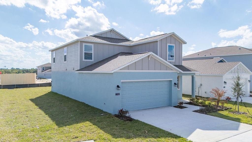 2182 Lasso Loop Eagle Lake, FL 33839 - Photo 2 of 47