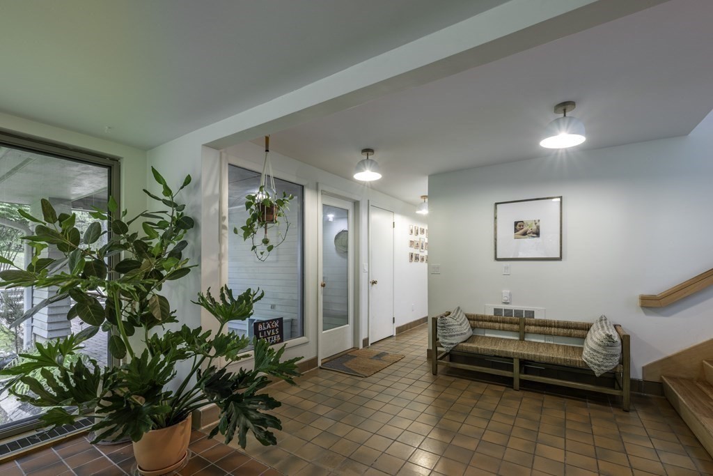 640 Kennedy Road Northampton, MA 01053 - Photo 12 of 42 a view of a livingroom with furniture and a potted plant