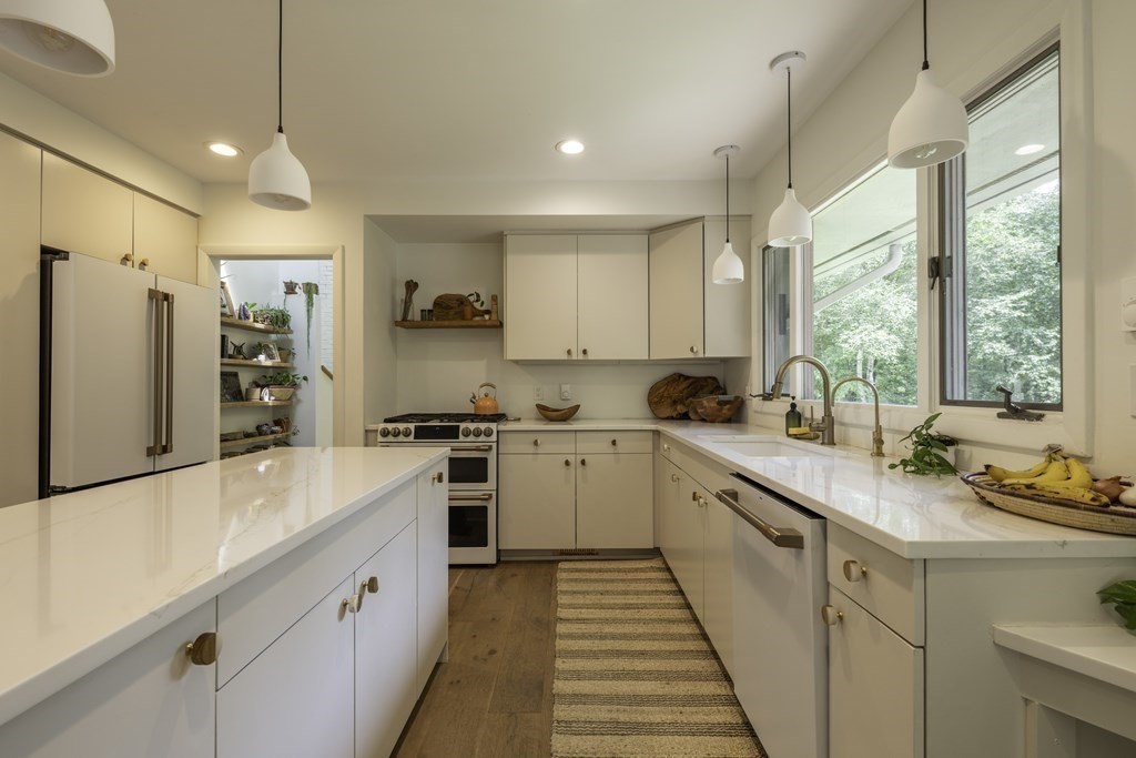 640 Kennedy Road Northampton, MA 01053 - Photo 20 of 42 a kitchen with white cabinets and white appliances