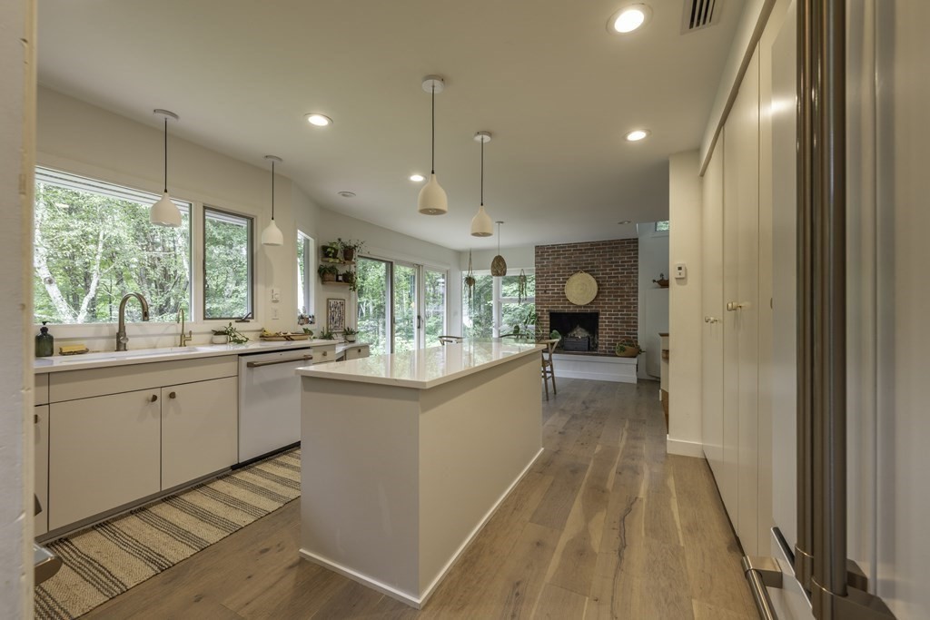 640 Kennedy Road Northampton, MA 01053 - Photo 24 of 42 a large white kitchen with a large window