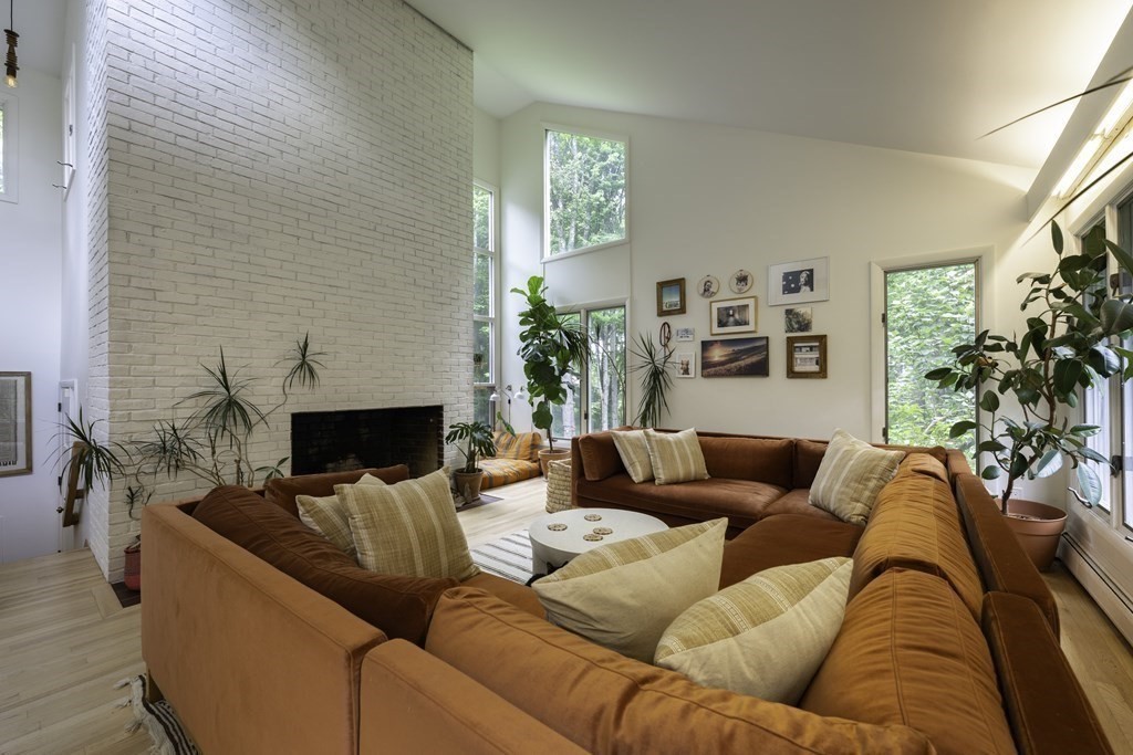 640 Kennedy Road Northampton, MA 01053 - Photo 26 of 42 a living room with furniture fireplace and a large window
