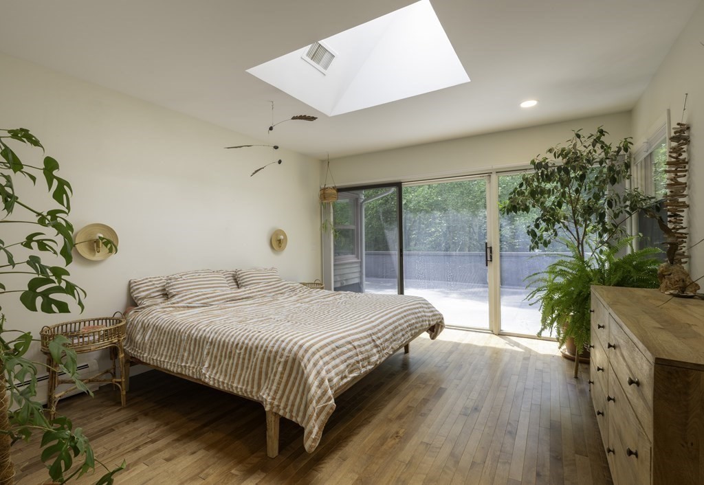 640 Kennedy Road Northampton, MA 01053 - Photo 29 of 42 a bedroom with a bed and a large window