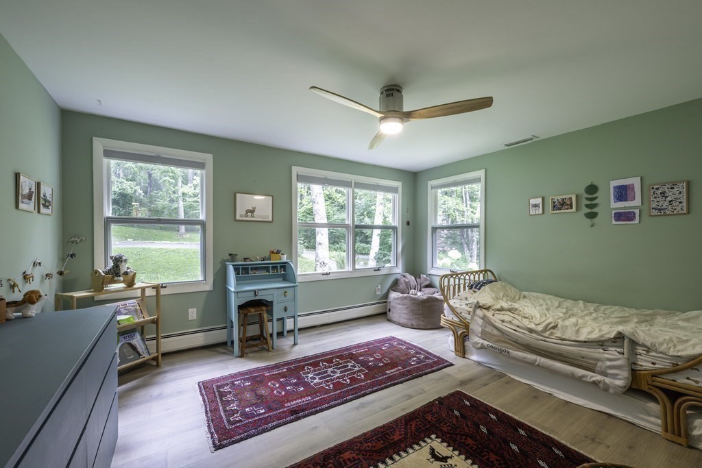 640 Kennedy Road Northampton, MA 01053 - Photo 35 of 42 a living room with furniture and a fireplace