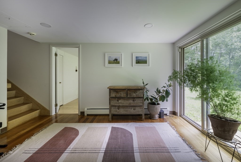 640 Kennedy Road Northampton, MA 01053 - Photo 40 of 42 a room with furniture and a potted plant