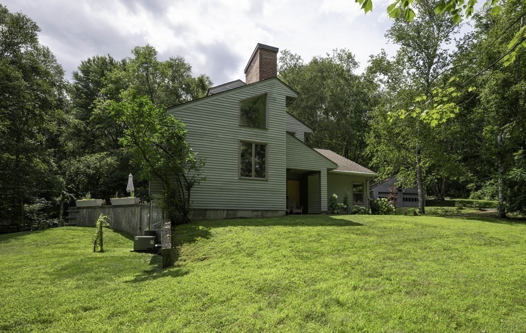 640 Kennedy Road Northampton, MA 01053 - Photo 6 of 42 a house that has a tree in front of it