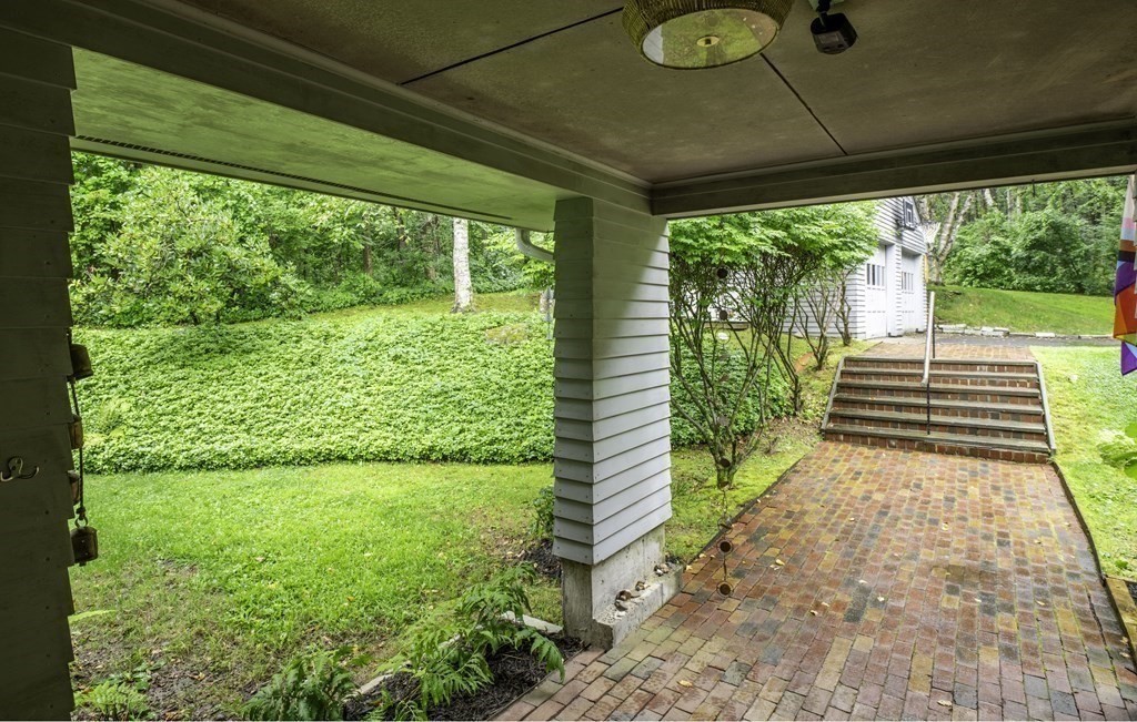 640 Kennedy Road Northampton, MA 01053 - Photo 9 of 42 a front view of a house with garden