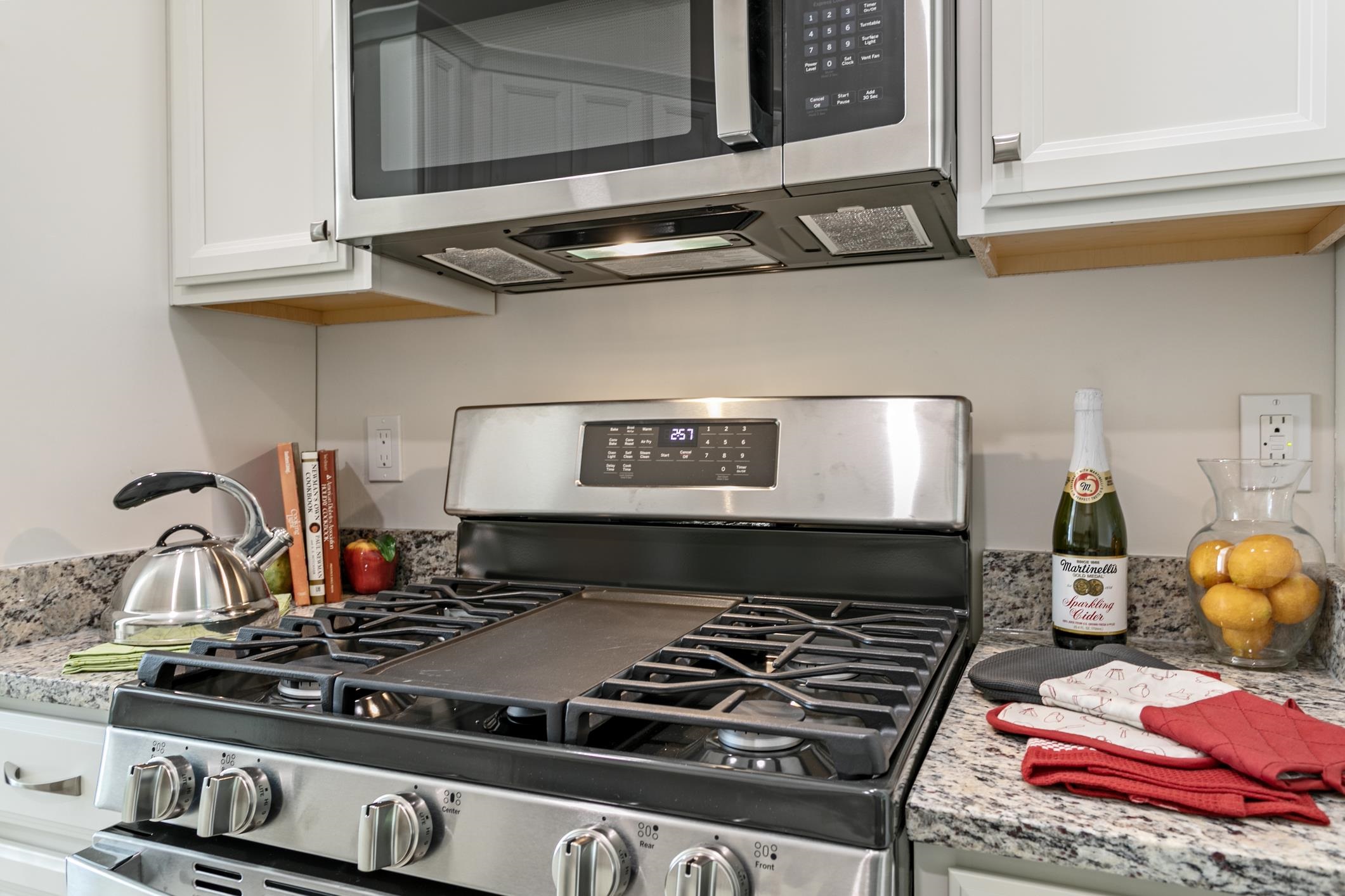 254 Grand Ravine Drive St. Augustine, FL 32086 - Photo 11 of 40 a stove top oven sitting inside of a kitchen