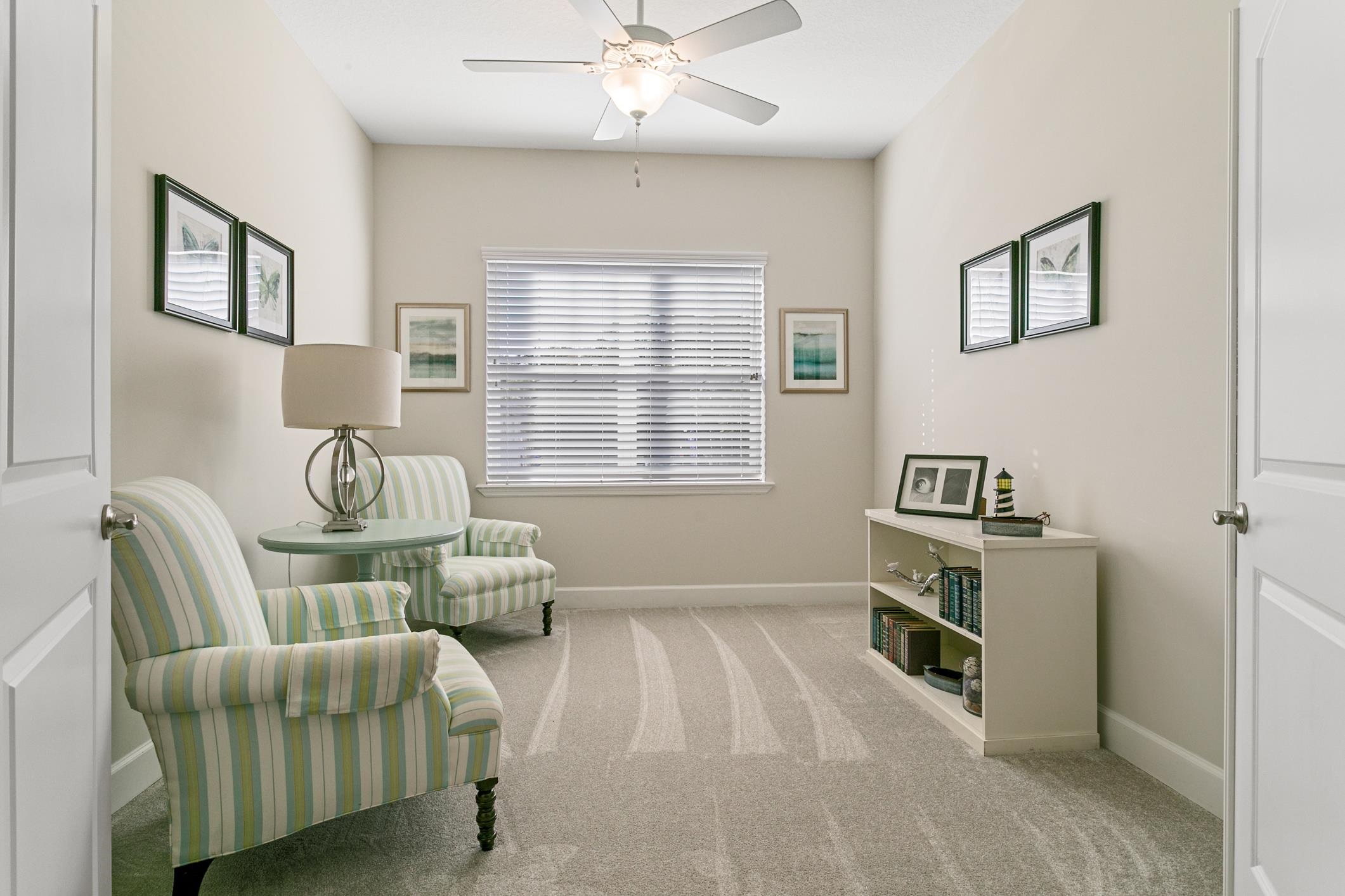 254 Grand Ravine Drive St. Augustine, FL 32086 - Photo 23 of 40 a bedroom with furniture and a window