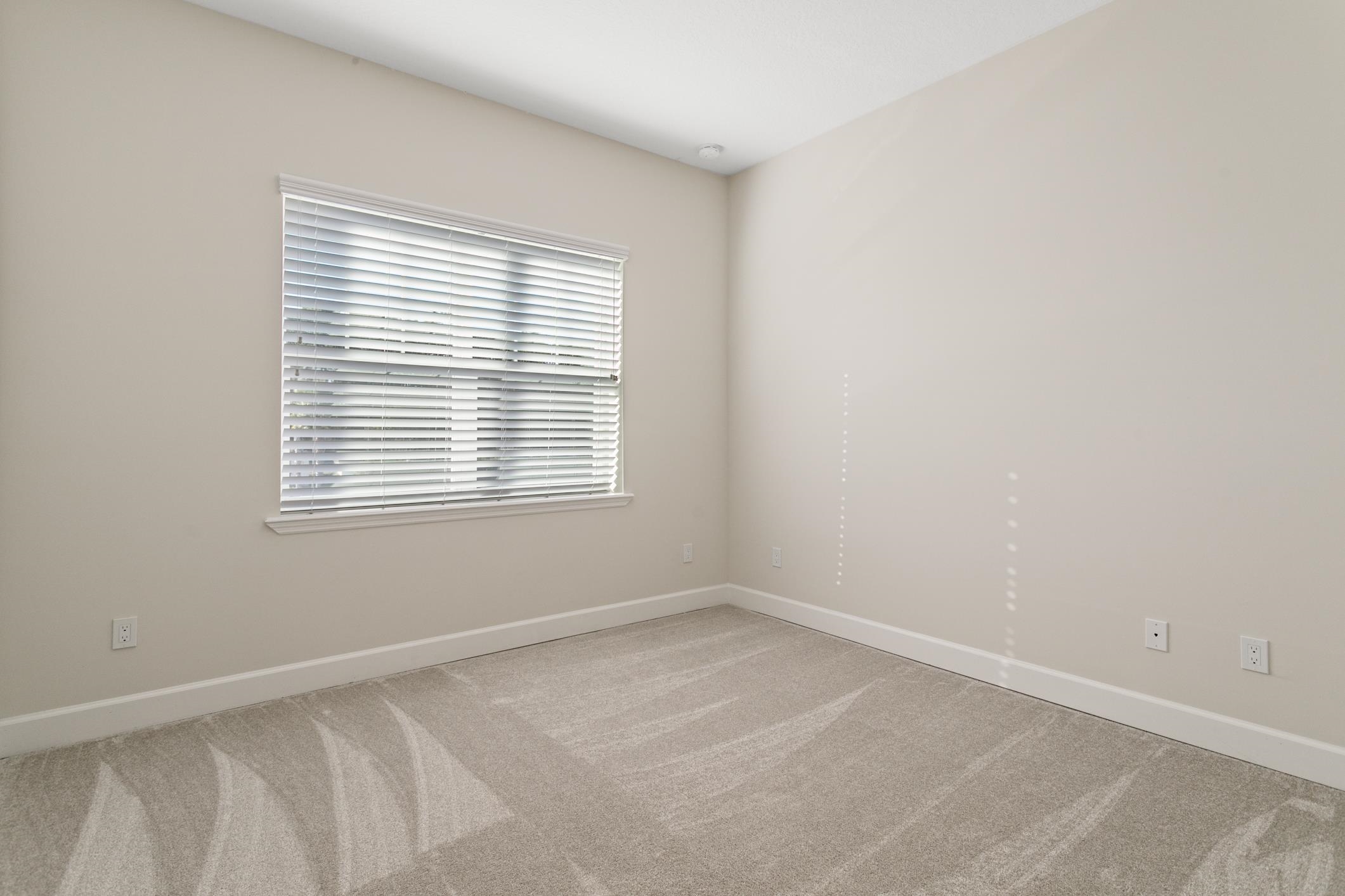 254 Grand Ravine Drive St. Augustine, FL 32086 - Photo 30 of 40 an empty room with a window