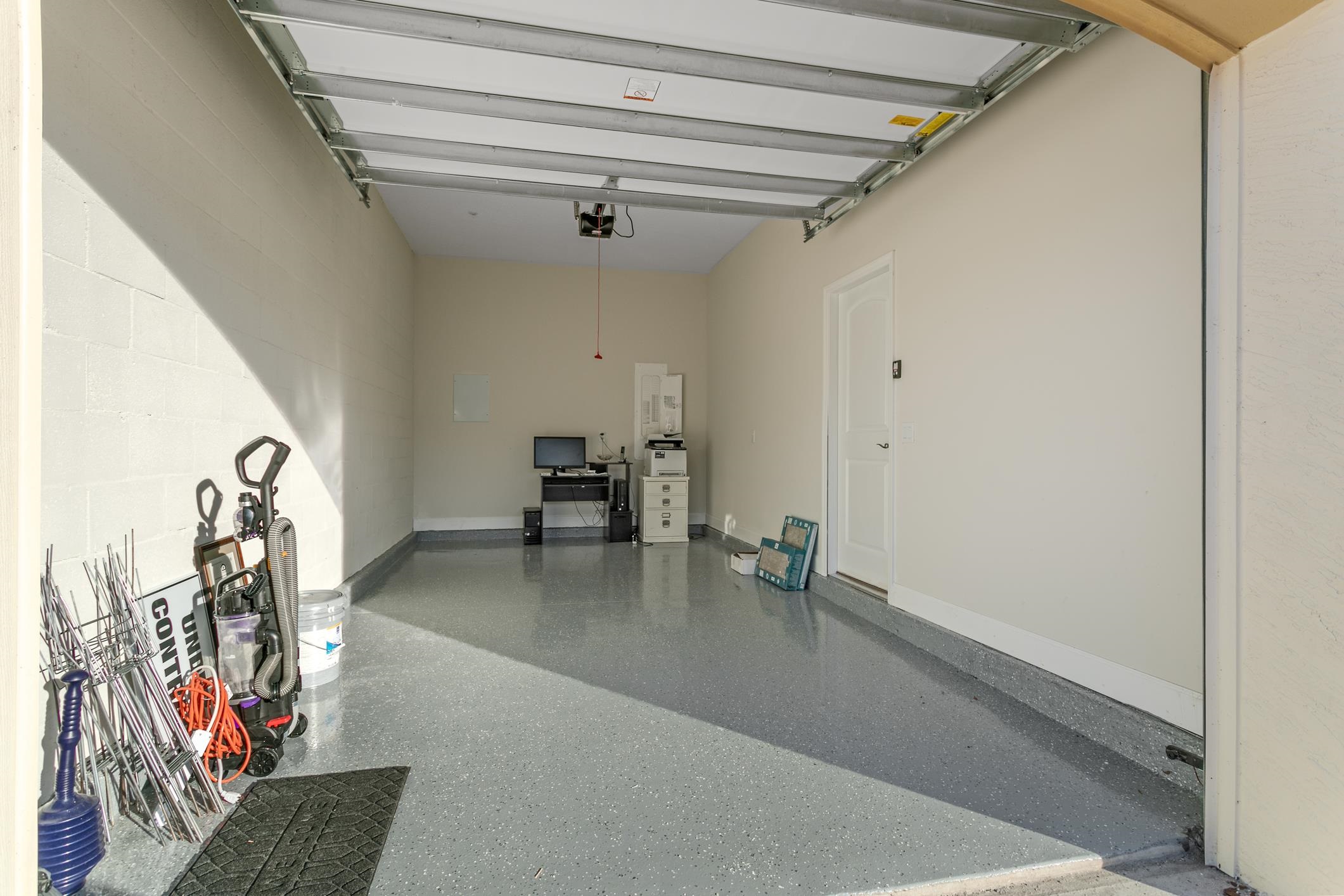 254 Grand Ravine Drive St. Augustine, FL 32086 - Photo 36 of 40 a view of a livingroom with hardwood floor and a ceiling fan