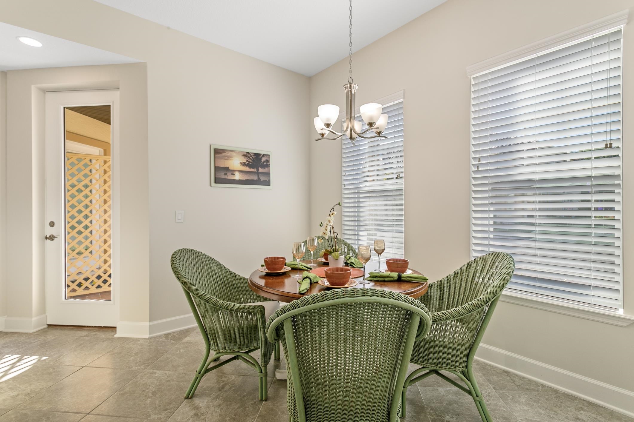 254 Grand Ravine Drive St. Augustine, FL 32086 - Photo 8 of 40 a dining room with furniture and window