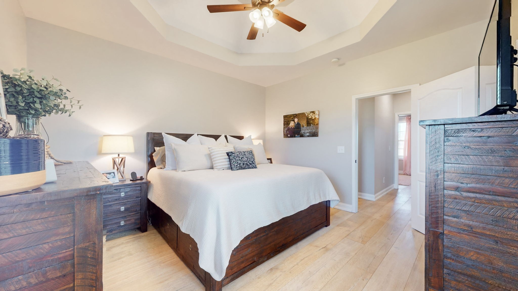 4784 Somerville Road Cross Plains, TN 37049 - Photo 17 of 41 a bedroom with a bed and a chandelier