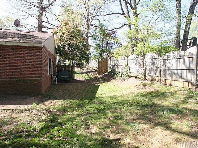 5418 Wayne Street Raleigh, NC 27606 - Photo 11 of 11 Fenced, Lawn, Cement Patio, All Brick Exterior. Back Yard