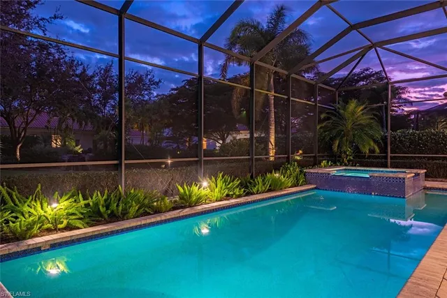 a view of swimming pool with a patio