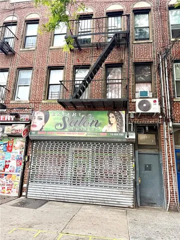 a front view of a building with glass windows