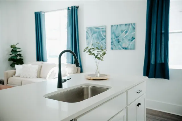 a kitchen with a stove and a microwave
