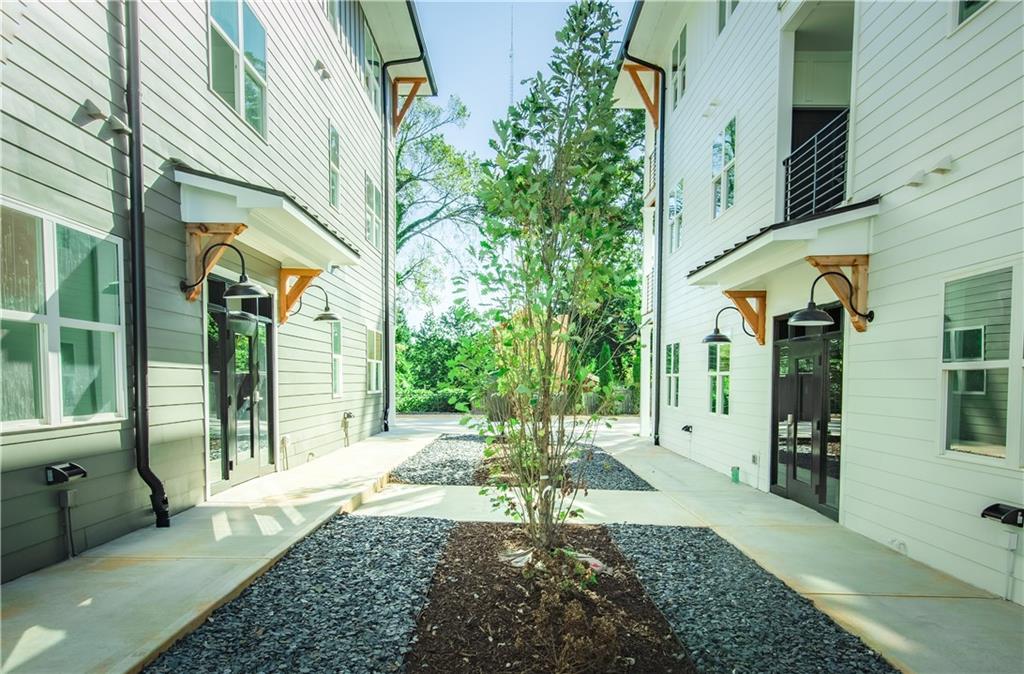 123 Mayson Avenue Northeast, Unit C Atlanta, GA 30307 - Photo 15 of 21 a view of a house with a garden