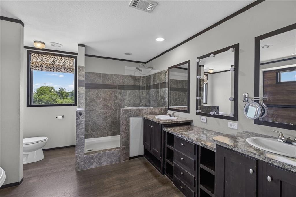 1129 Ragsdale Street Terrell, TX 75160 - Photo 9 of 29 Tiled separate shower, double sinks and separate tub. Lots of space, you will love it