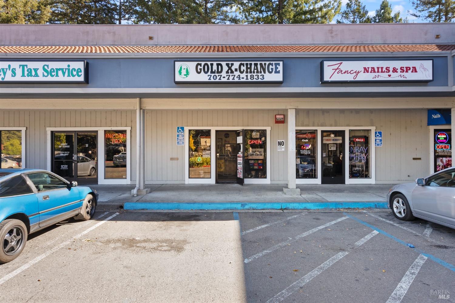 a view of a car park in front of building