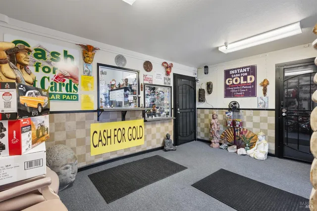 a view of a room with furniture and toys