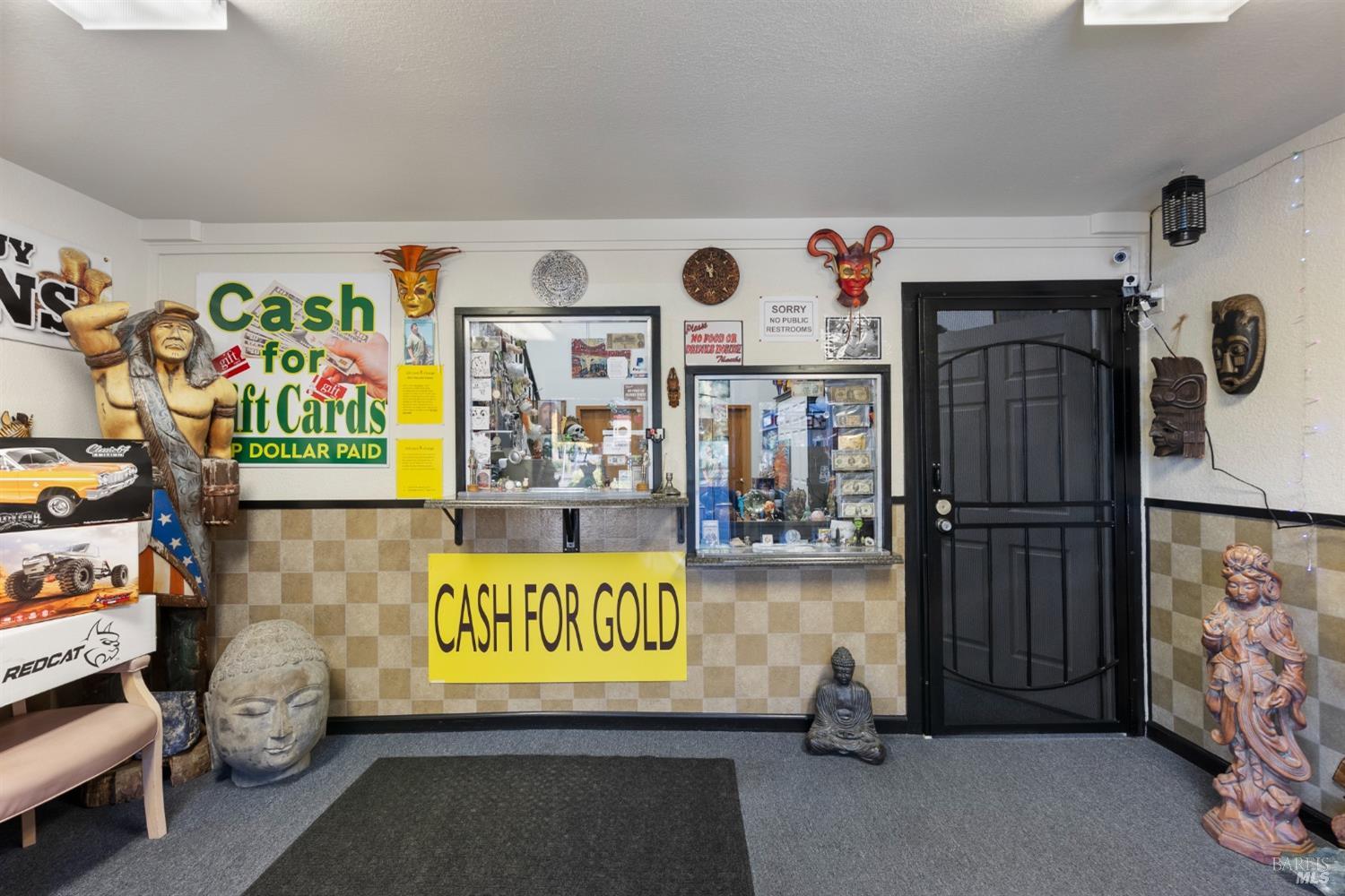 6650 Commerce Boulevard, Unit 16 Rohnert Park, CA 94928 - Photo 3 of 15 a room with lots of white furniture and a window