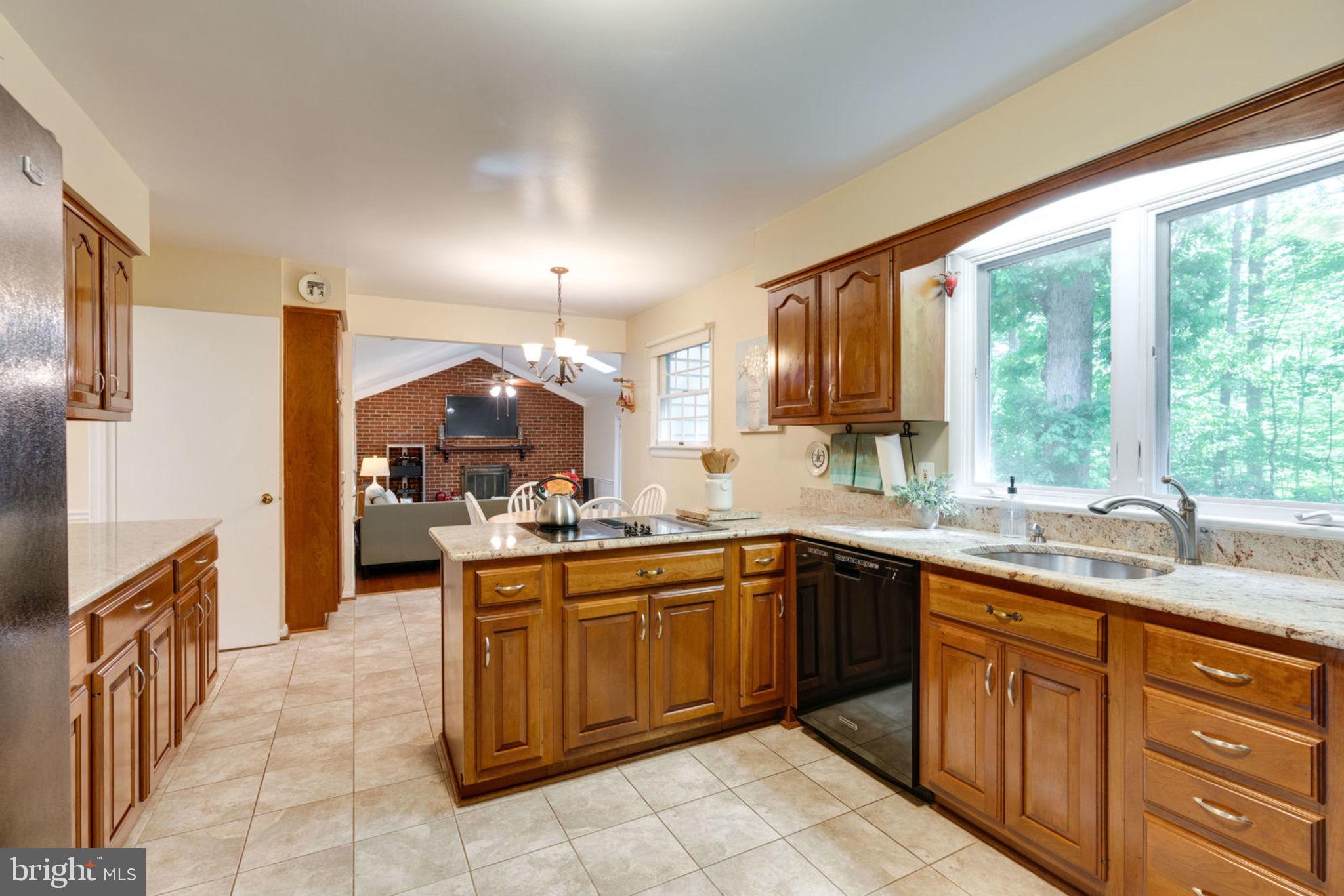 8504 Shadeway Place Springfield, VA 22153 - Photo 12 of 31 Open Kitchen, Nook & Family Room Concept