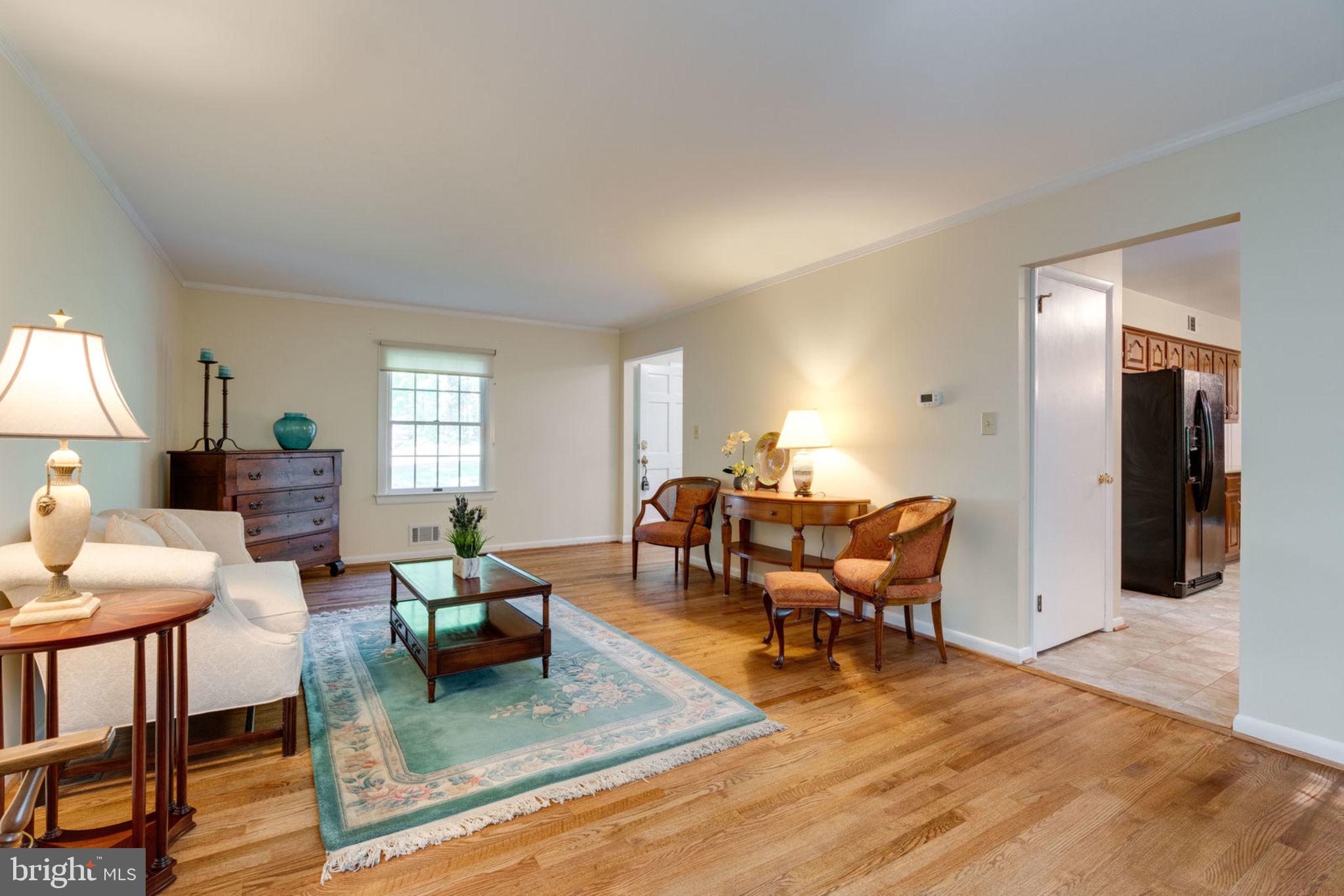 8504 Shadeway Place Springfield, VA 22153 - Photo 9 of 31 Living Room w/ Refinished Hardwood Floors