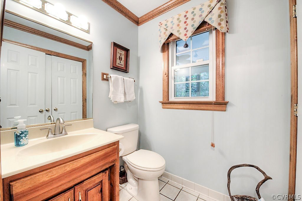12808 Rivers Bend Road Chester, VA 23836 - Photo 17 of 41 a bathroom with a sink toilet and a mirror