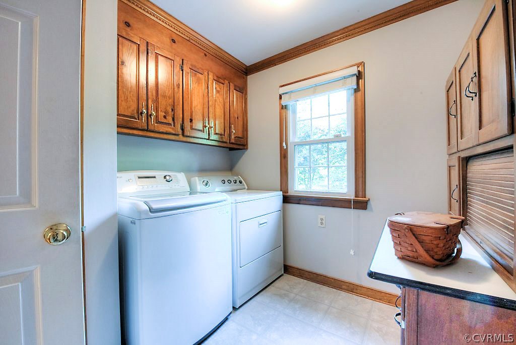 12808 Rivers Bend Road Chester, VA 23836 - Photo 27 of 41 a utility room with closet dryer and washer