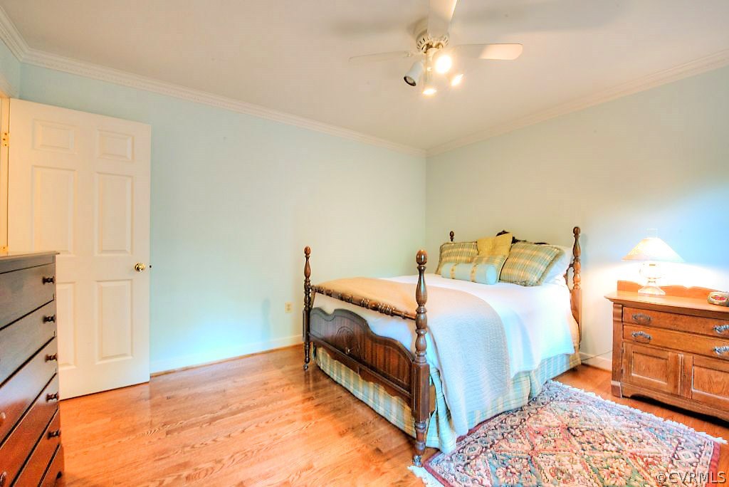 12808 Rivers Bend Road Chester, VA 23836 - Photo 38 of 41 a bedroom with a bed and closet
