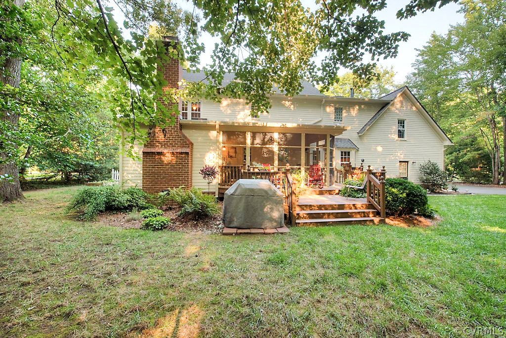 12808 Rivers Bend Road Chester, VA 23836 - Photo 6 of 41 a view of a house with backyard and sitting area