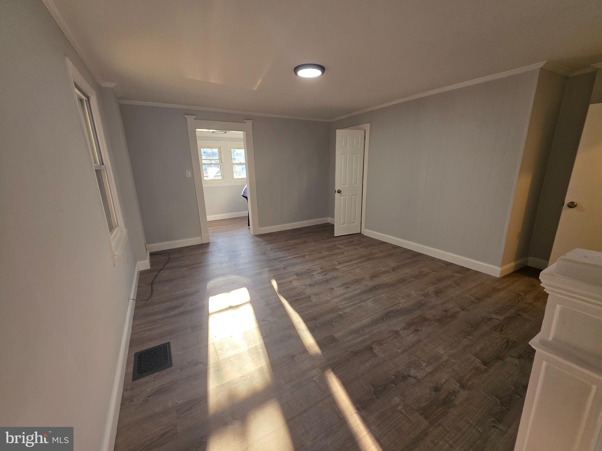 340 Middlesex Street Gloucester City, NJ 08030 - Photo 3 of 17 a view of entryway with wooden floor