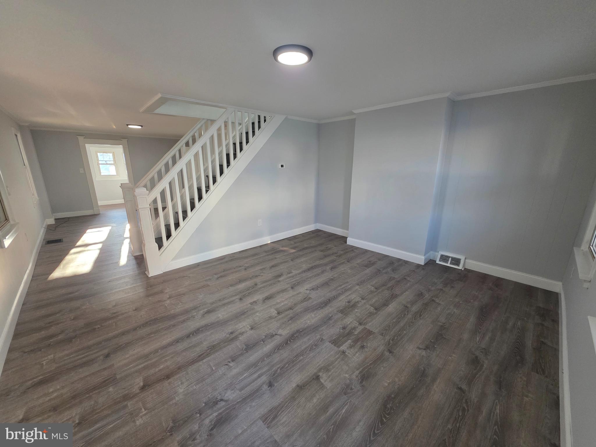 340 Middlesex Street Gloucester City, NJ 08030 - Photo 4 of 17 a view of entryway with wooden floor