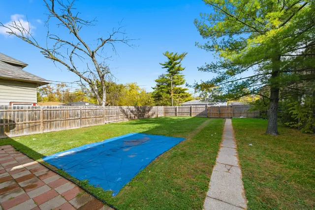 a view of an outdoor space and a yard