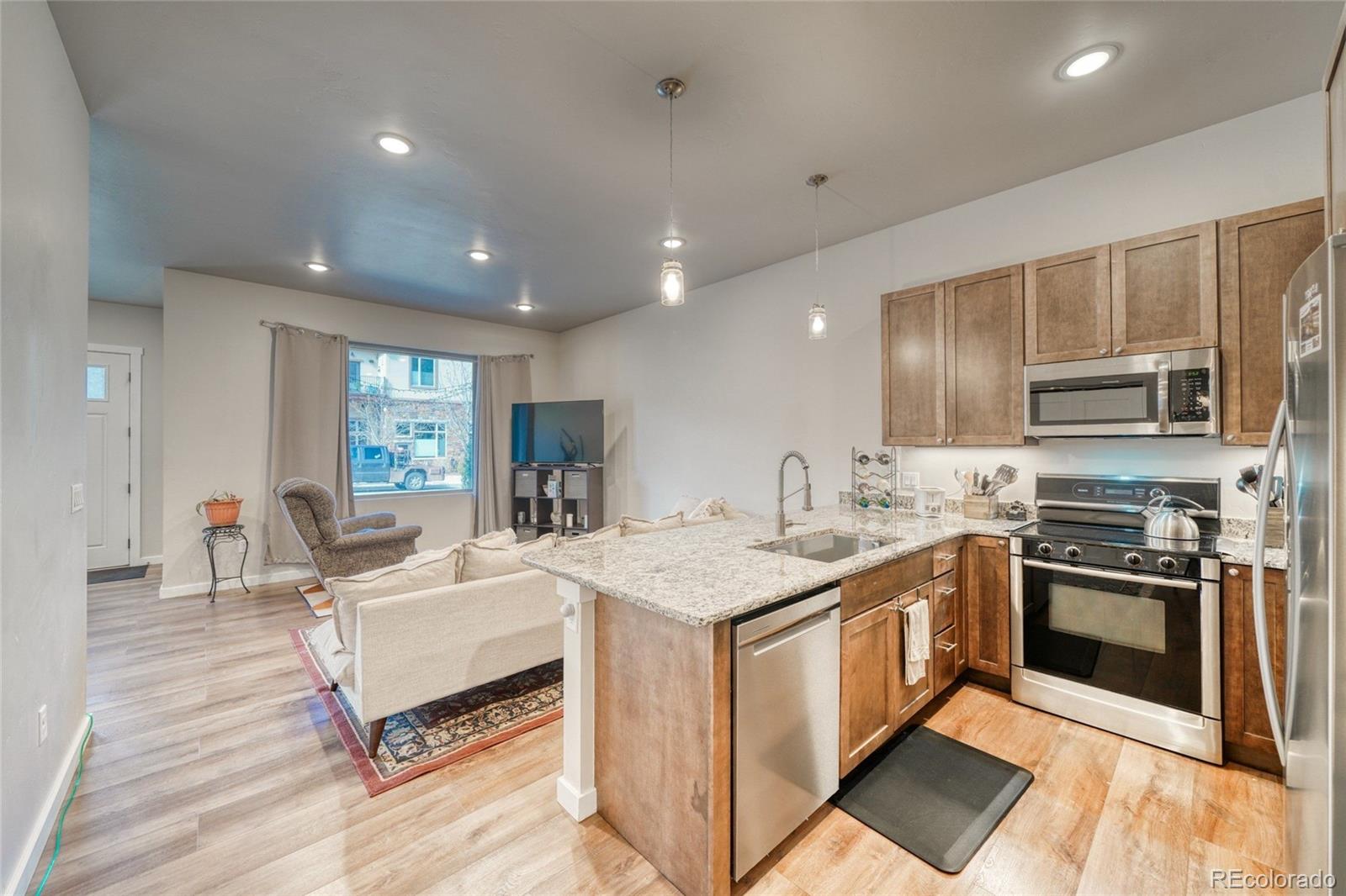 209 Summitview Lane Poncha Springs, CO 81201 - Photo 11 of 44 a kitchen with a stove sink and microwave