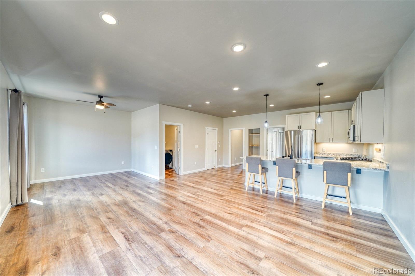 209 Summitview Lane Poncha Springs, CO 81201 - Photo 21 of 44 a view of a kitchen and dining room