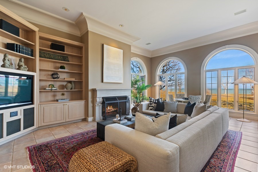 700 Crab Tree Lane Lake Bluff, IL 60044 - Photo 17 of 51 a living room with furniture fireplace and cabinet