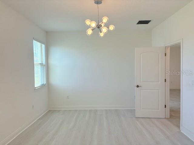 7408 Wing Span Way Harmony, FL 34773 - Photo 11 of 30 a view of an empty room with window