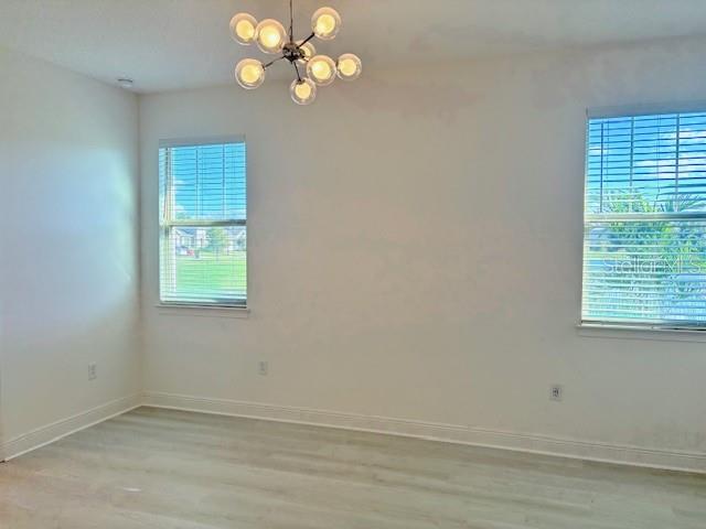 7408 Wing Span Way Harmony, FL 34773 - Photo 13 of 30 an empty room with a window