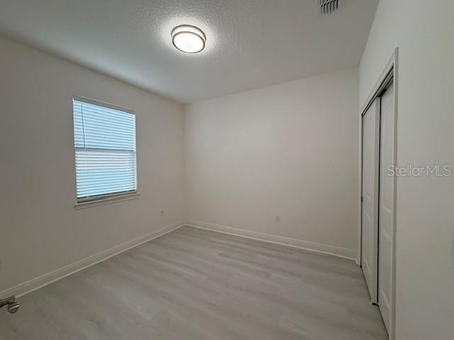 7408 Wing Span Way Harmony, FL 34773 - Photo 17 of 30 an empty room with a window